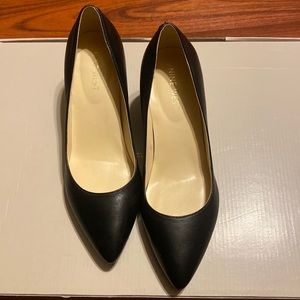 Nine West, only worn around the house to try on, they fit me too tight.